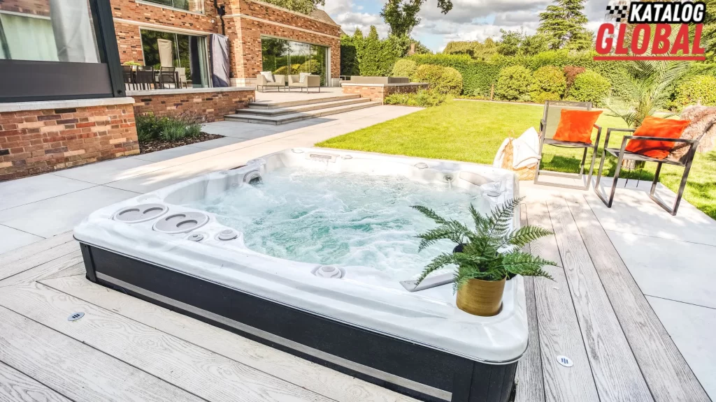 A bubbling hot tub in a sunny backyard with modern decor. How much does a hot tub cost?