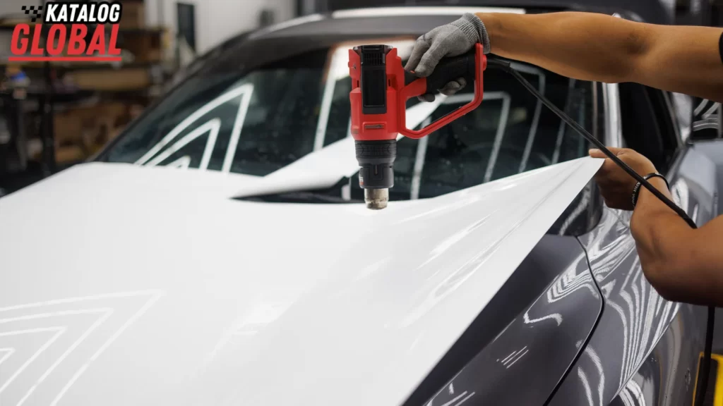 How Much Does a Wrap Cost: Applying White Vinyl Wrap with Heat Gun