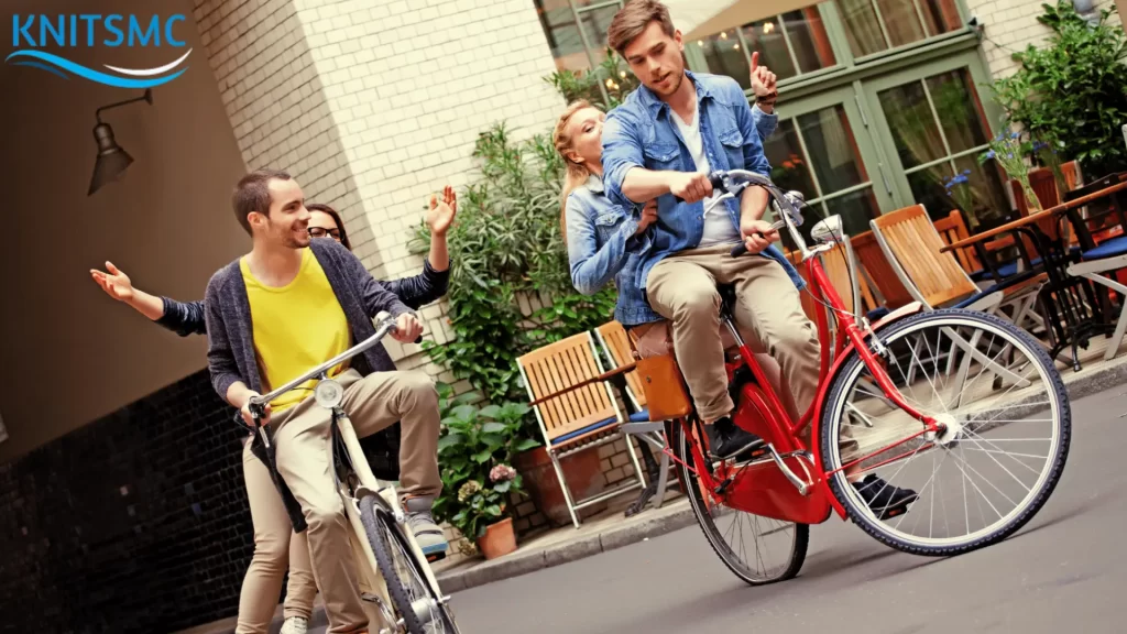 A group of friends enjoying a bike ride together on city streets, raising the question, "Can You Get a DUI on a Bike?